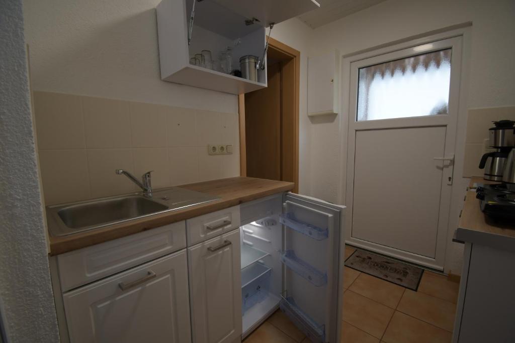 Kuchyň nebo kuchyňský kout v ubytování Tiny-Bungalow - zum Strand 50m