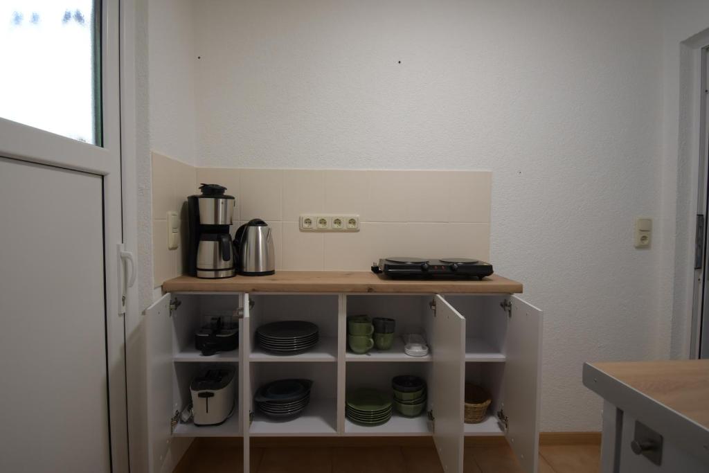 Kuchyň nebo kuchyňský kout v ubytování Tiny-Bungalow - zum Strand 50m