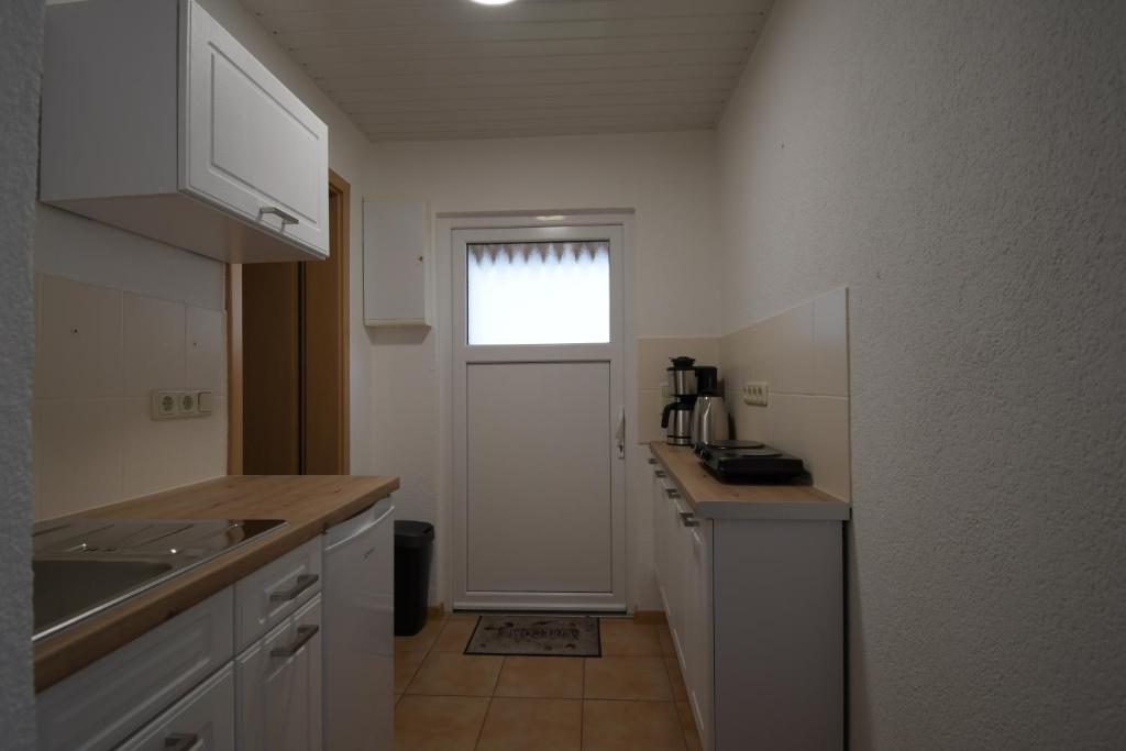 Kuchyň nebo kuchyňský kout v ubytování Tiny-Bungalow - zum Strand 50m