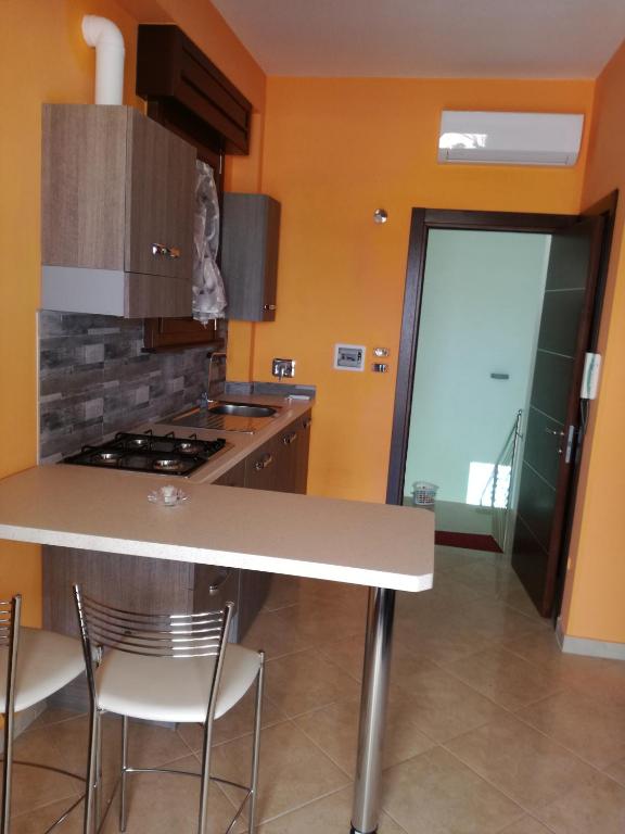 Kuchyň nebo kuchyňský kout v ubytování Gagliardo House