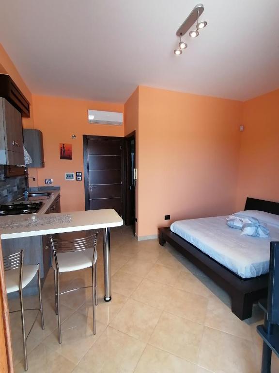 Postel nebo postele na pokoji v ubytování Gagliardo House