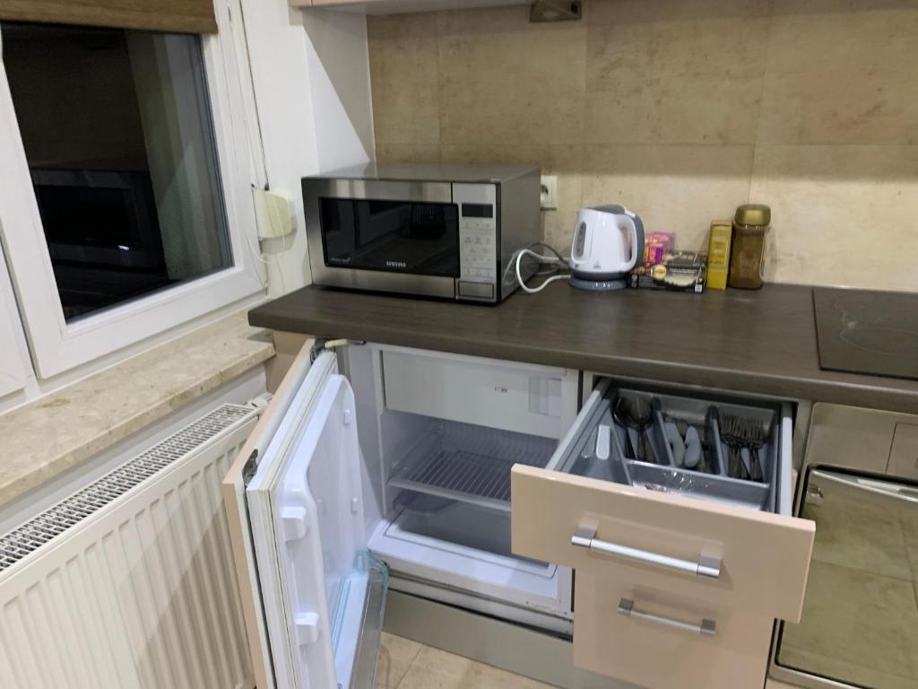 Kuchyňa alebo kuchynka v ubytovaní Apartament Kawowy