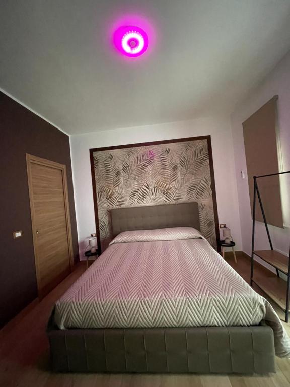 Postel nebo postele na pokoji v ubytování RESIDENCE GORDON