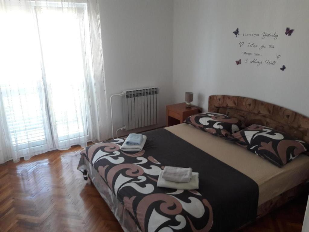 Posteľ alebo postele v izbe v ubytovaní Apartments Amalia