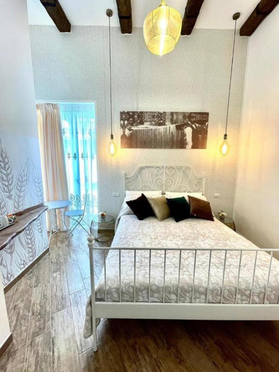 Postel nebo postele na pokoji v ubytování Granoro Gragnano B&B