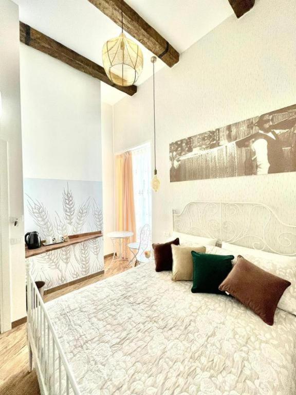 Postel nebo postele na pokoji v ubytování Granoro Gragnano B&B