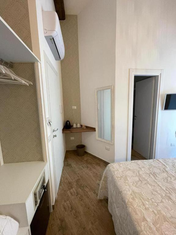 Postel nebo postele na pokoji v ubytování Granoro Gragnano B&B