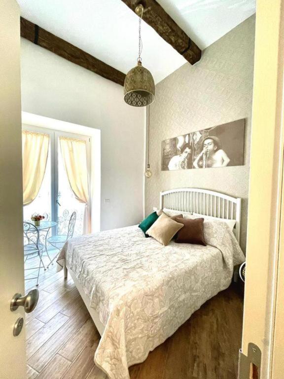 Postel nebo postele na pokoji v ubytování Granoro Gragnano B&B