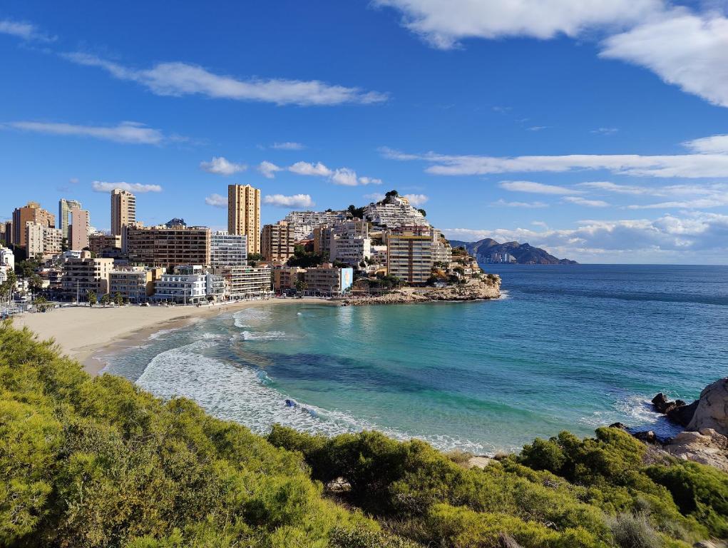 a view of the city and the beach at CALA ALTA sun&beach apartaments in Cala de Finestrat