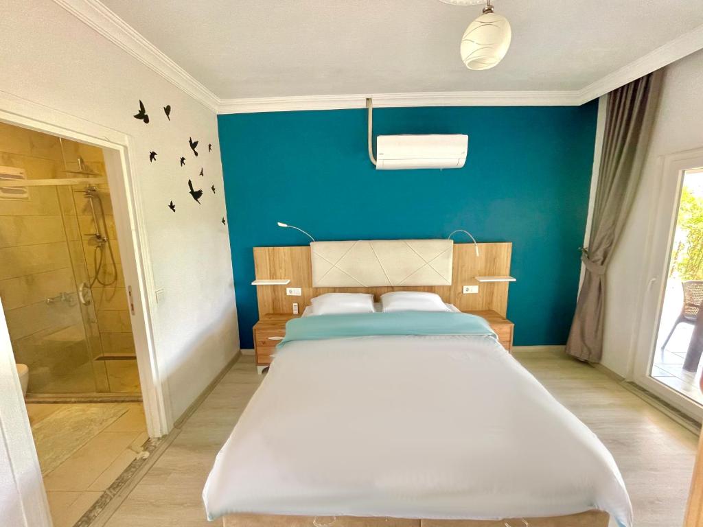 Postel nebo postele na pokoji v ubytování Airport Guest House