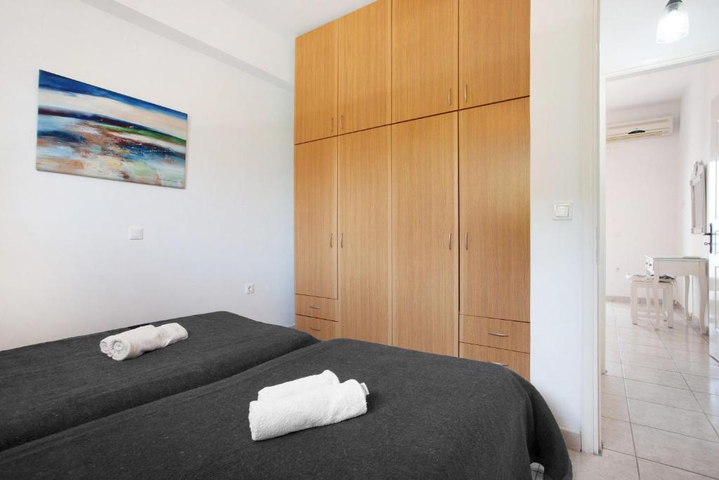Posteľ alebo postele v izbe v ubytovaní Yiannis Superior Apartment 8