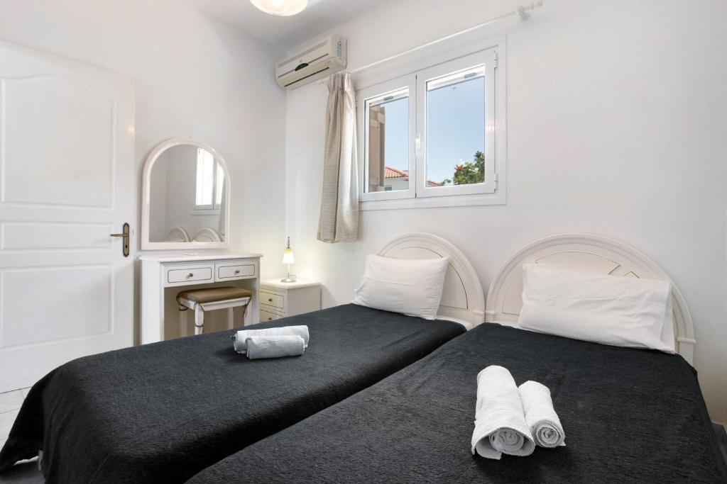 Posteľ alebo postele v izbe v ubytovaní Yiannis Superior Apartment 8