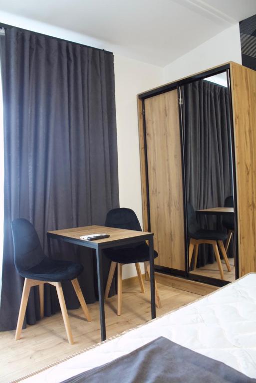 Postel nebo postele na pokoji v ubytování Forsage Hotel