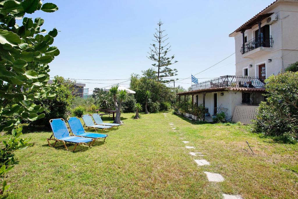 A garden outside Yiannis Suite with Sea View 10