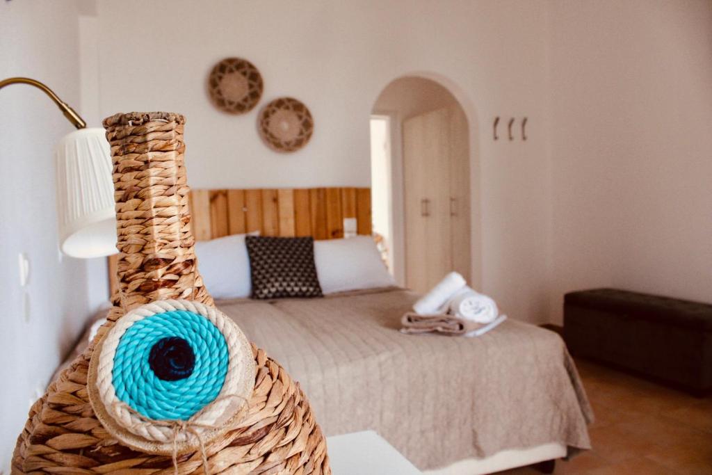 Кровать или кровати в номере Afroditi Junior Suites
