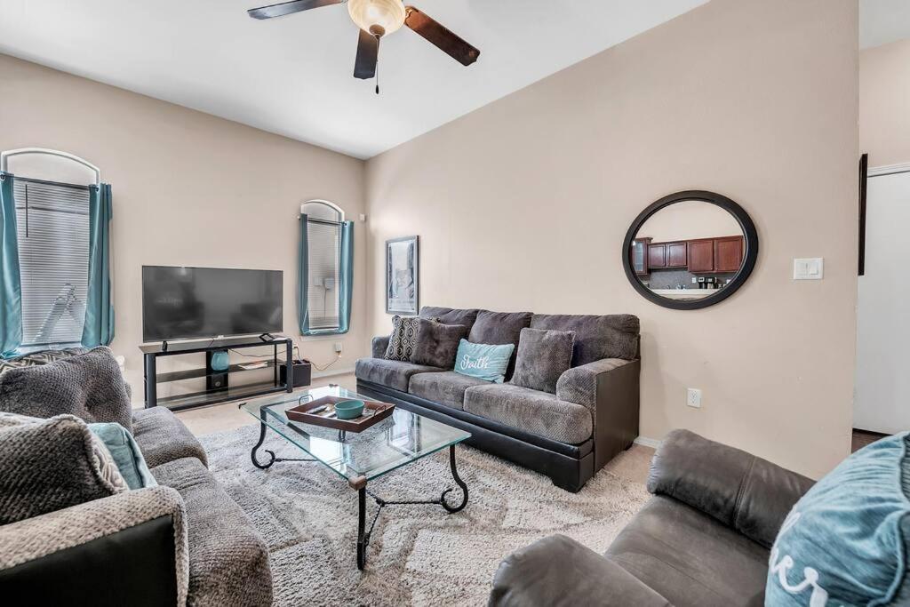 a living room with two couches and a tv at Comfy Classy Home, Close To Everything in El Paso