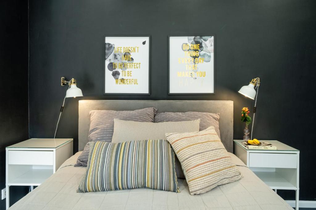 Posteľ alebo postele v izbe v ubytovaní Apartamenty Stara Warszawska 43