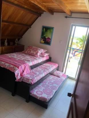 Postel nebo postele na pokoji v ubytování CHALET SANTORINI