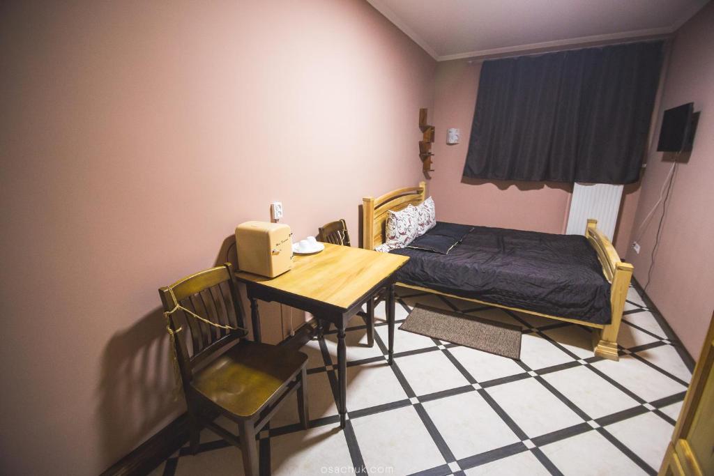 Postel nebo postele na pokoji v ubytování SAMARIANKA hotel