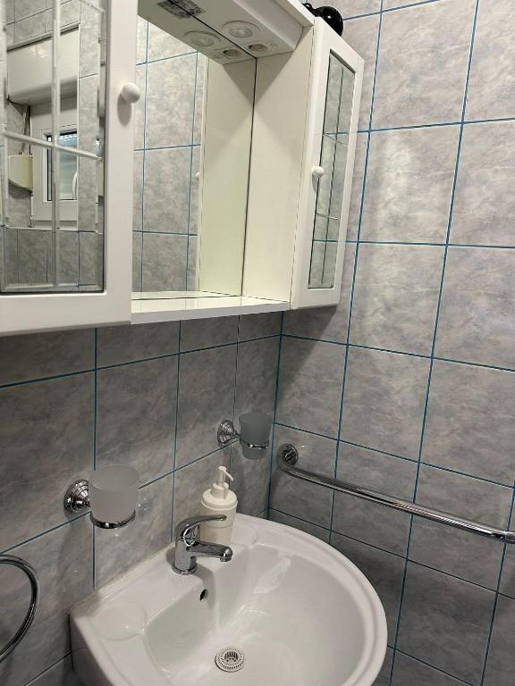 Koupelna v ubytování Apartmani Karlobag