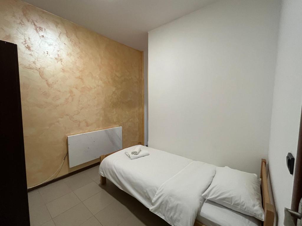Postel nebo postele na pokoji v ubytování Apartmani Bosfor