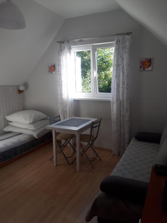 Postel nebo postele na pokoji v ubytování Przy morzu