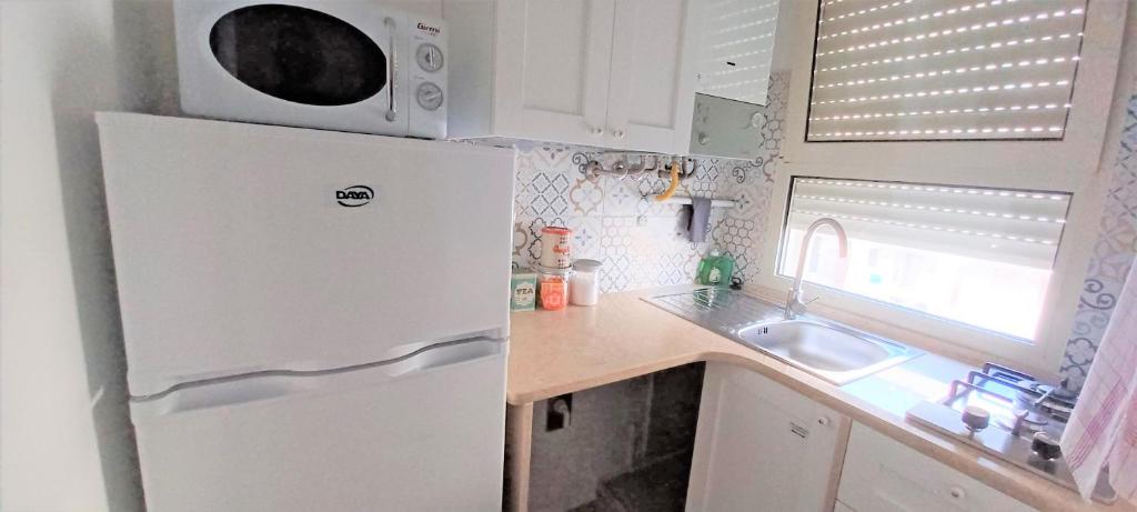Kuchyň nebo kuchyňský kout v ubytování Tagghiate House