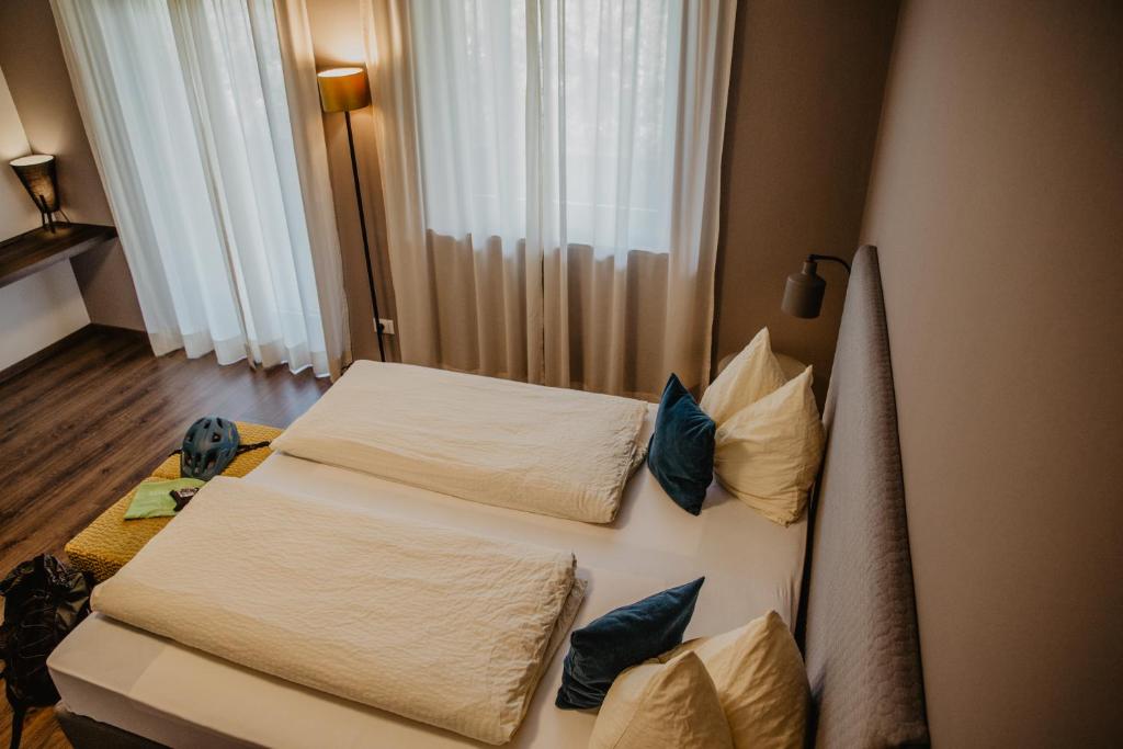 Postel nebo postele na pokoji v ubytování Feldgärtenhof