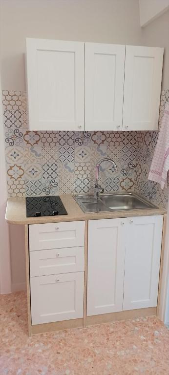 Kuchyň nebo kuchyňský kout v ubytování Tagghiate House