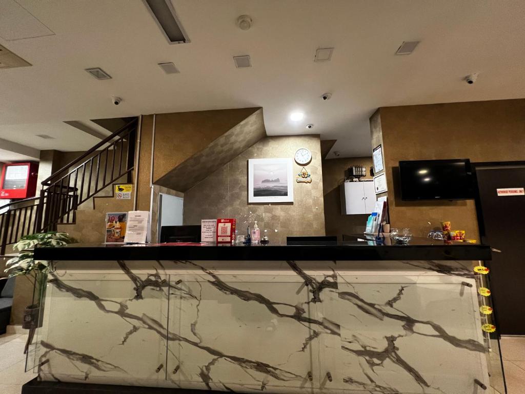 Kuchyň nebo kuchyňský kout v ubytování Signature Hotel