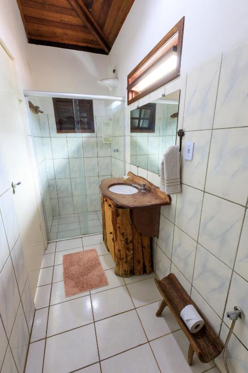 Um banheiro em Pousada Alto do Cajueiro