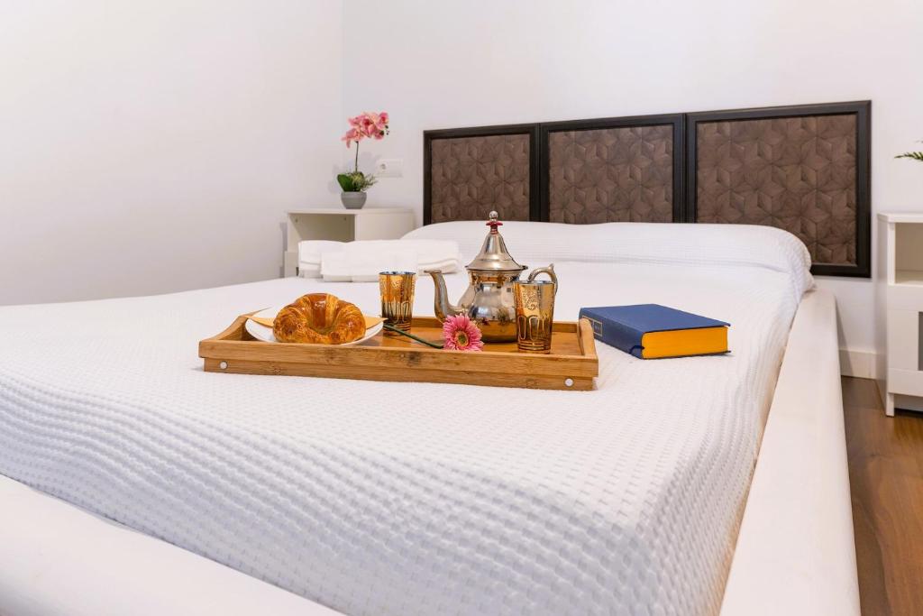 Posteľ alebo postele v izbe v ubytovaní SANTA PAULA LOFT