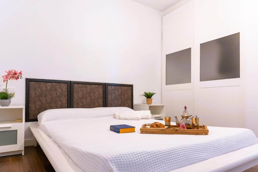 Posteľ alebo postele v izbe v ubytovaní SANTA PAULA LOFT