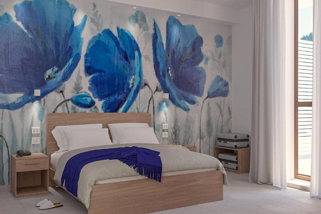 Postel nebo postele na pokoji v ubytování Eraora Hotel Village
