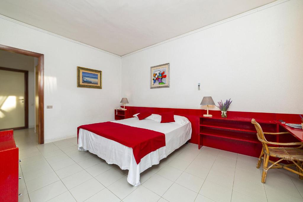 Postel nebo postele na pokoji v ubytování Eraora Hotel Village