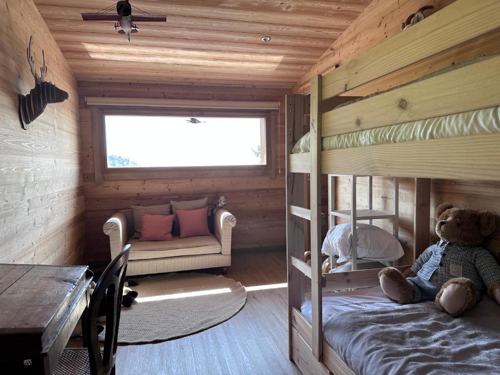 Postel nebo postele na pokoji v ubytování Chalet La Petite Ourse