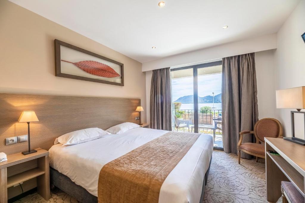 Postel nebo postele na pokoji v ubytování Hotel Shegara
