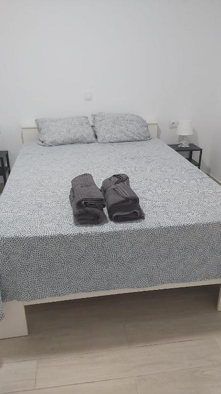 Posteľ alebo postele v izbe v ubytovaní BeachFront House