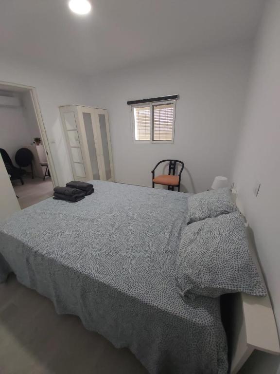 Posteľ alebo postele v izbe v ubytovaní BeachFront House