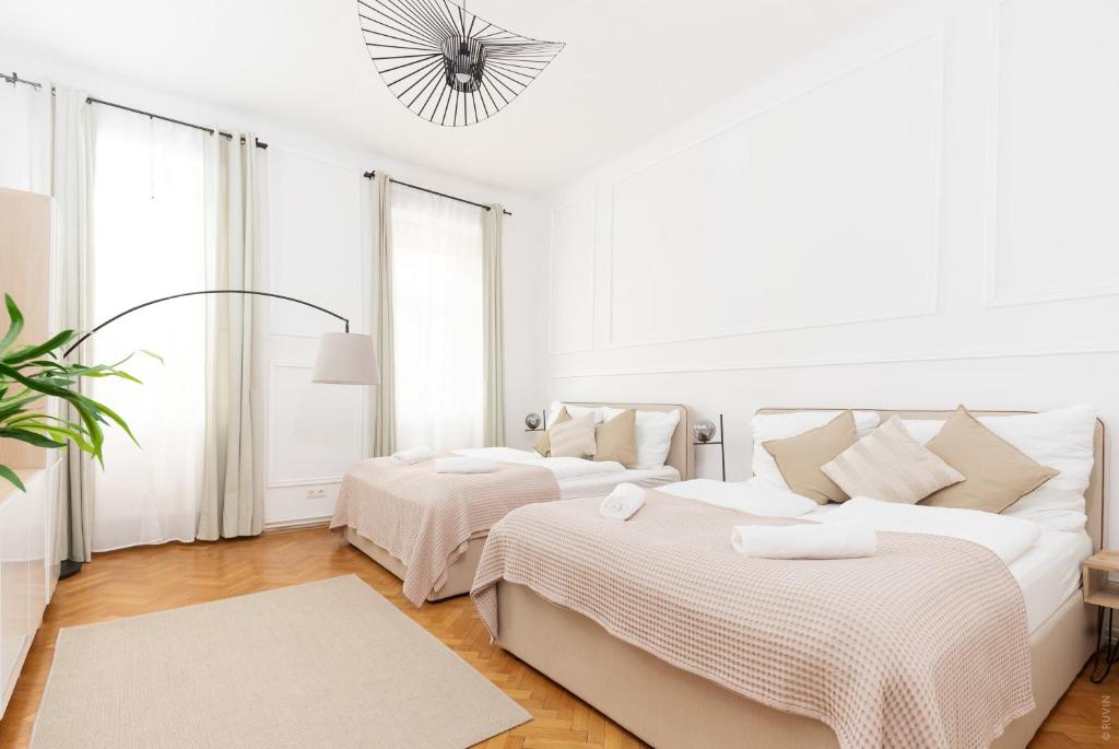 Säng eller sängar i ett rum på Designer Apartment, Close to Schönbrunn