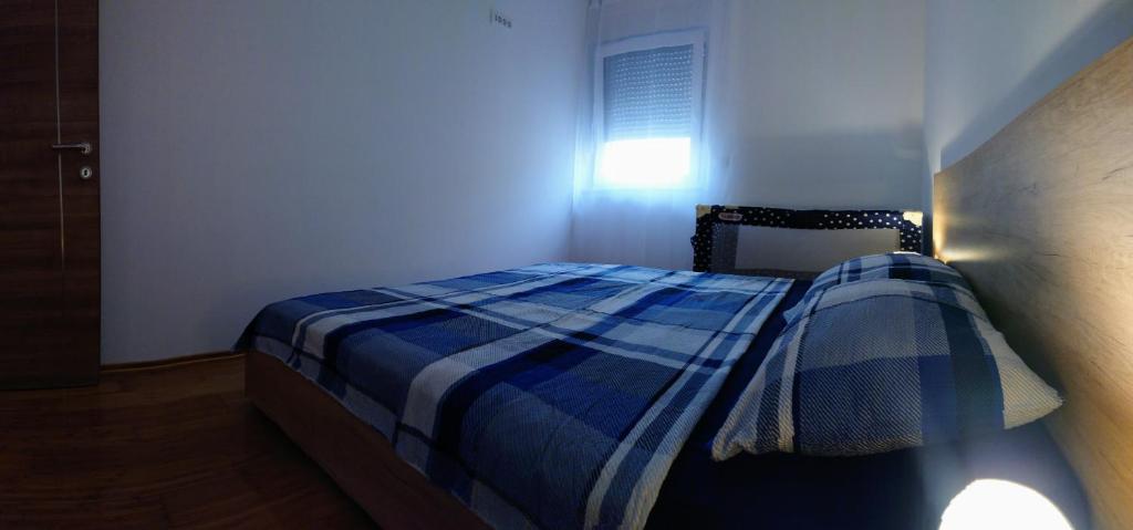 Letto o letti in una camera di West Star Apartment