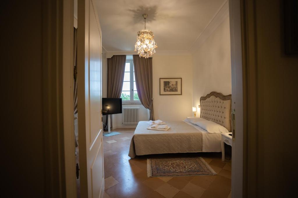 Postel nebo postele na pokoji v ubytování Villa Nena