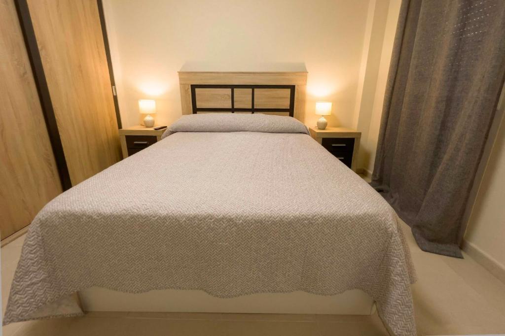 Posteľ alebo postele v izbe v ubytovaní Destino Deluxe Vera Playa - Laguna Beach