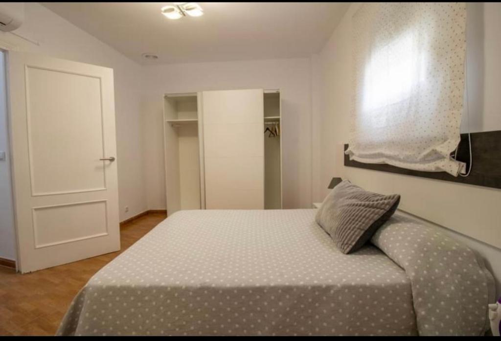 Postel nebo postele na pokoji v ubytování Vivienda con Fines Turísticos Salvador