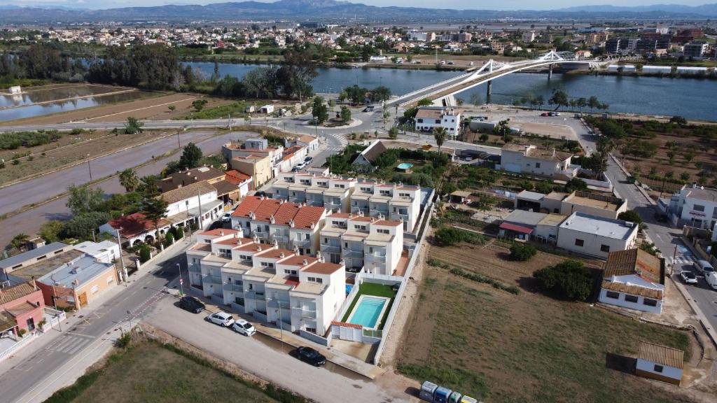 an aerial view of a city with a bridge at EBRE-SET in Sant Jaume d'Enveja