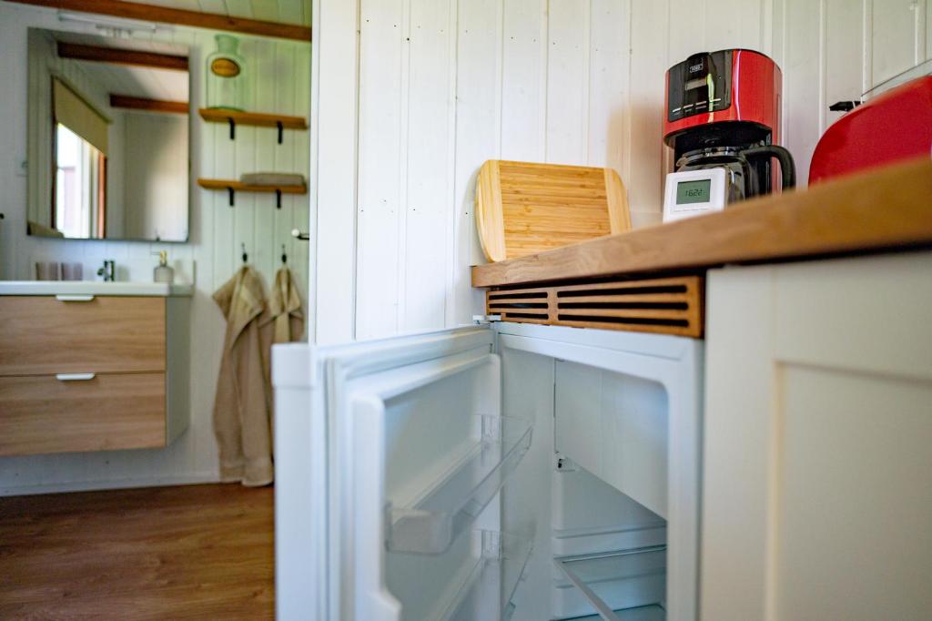 Kuchyň nebo kuchyňský kout v ubytování Tiny House 300 Meter vom Zentrum entfernt