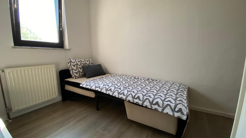 Postel nebo postele na pokoji v ubytování Apartma Nomad