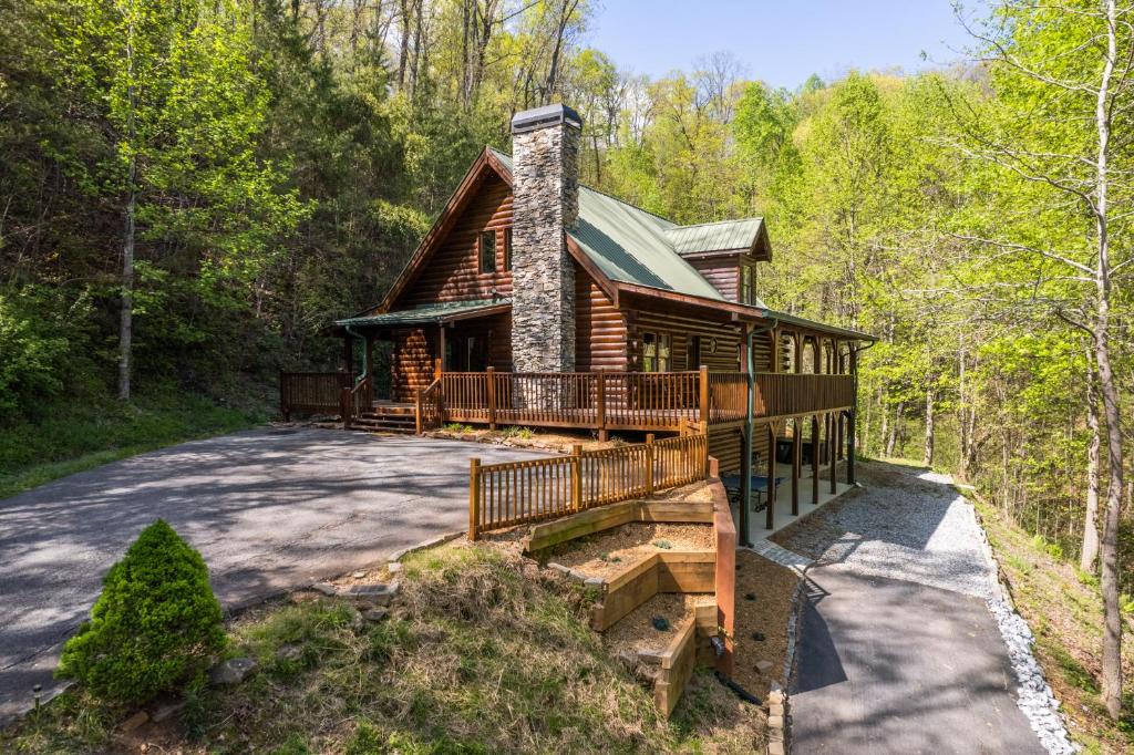 an aerial view of a log cabin in the woods at New Listing! Lakeview Lodge - 5 Bed, 4 Bath - Hot Tub in Dahlonega