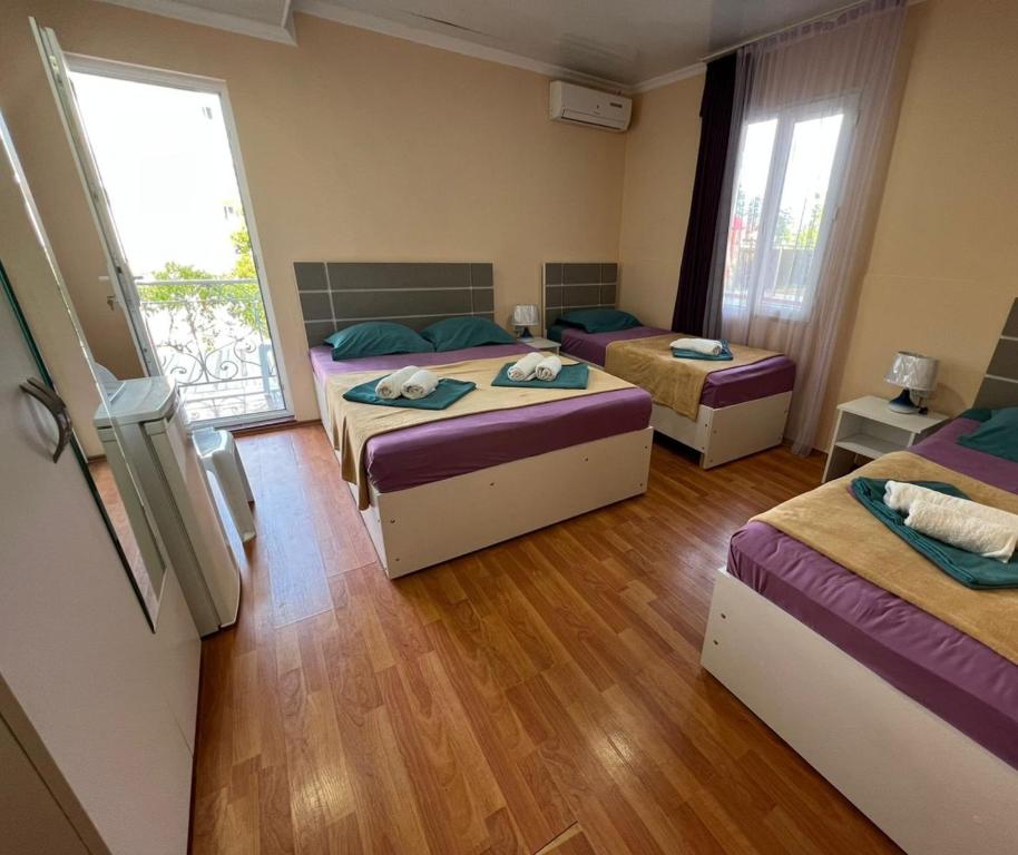 Postel nebo postele na pokoji v ubytování Imeri Hotel