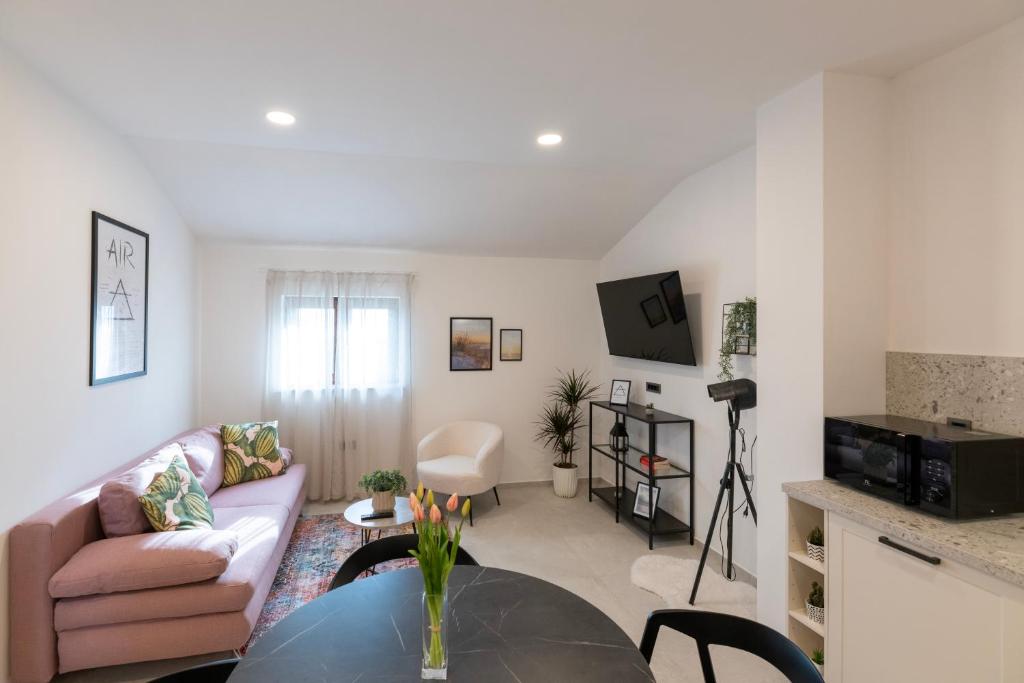 TV a/nebo společenská místnost v ubytování 4 ELEMENTS - Luxury Family Apartments